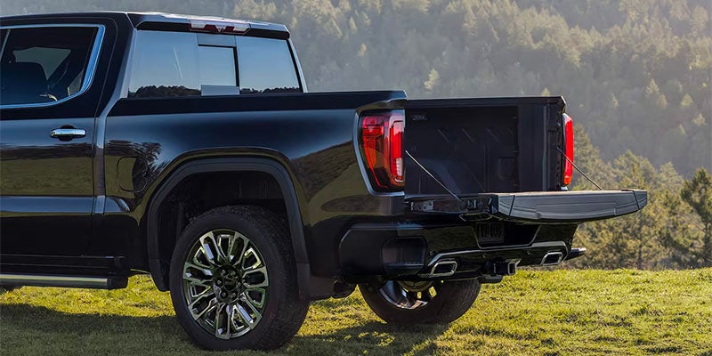 Back of a 2025 GMC Sierra 1500 with truck bed down